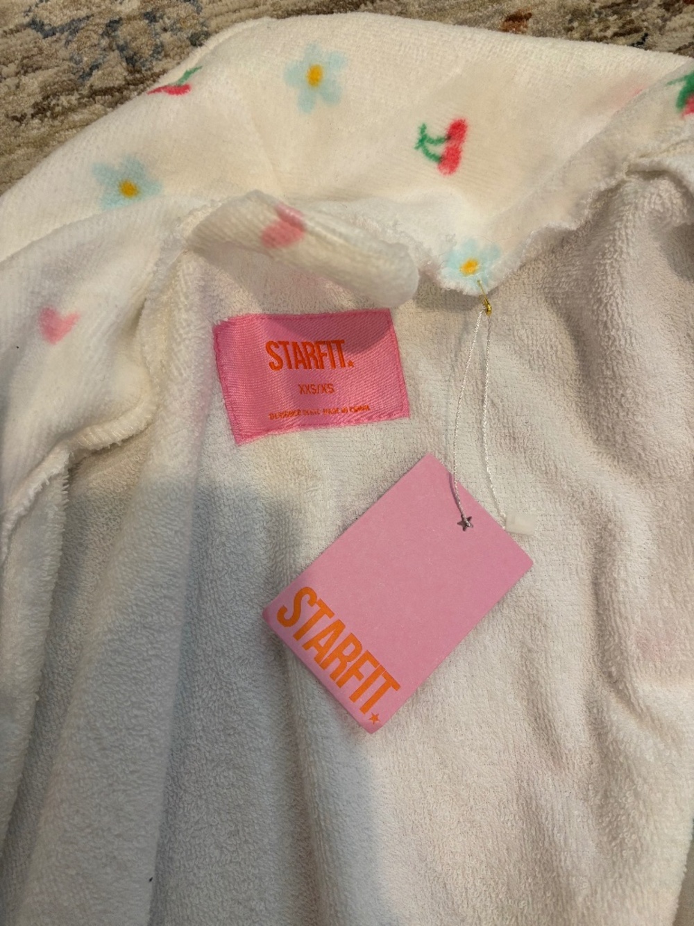 Mainly white starfit robe size xxs/xs runs very large